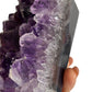 Amethyst geode tower close-up of crystals on side