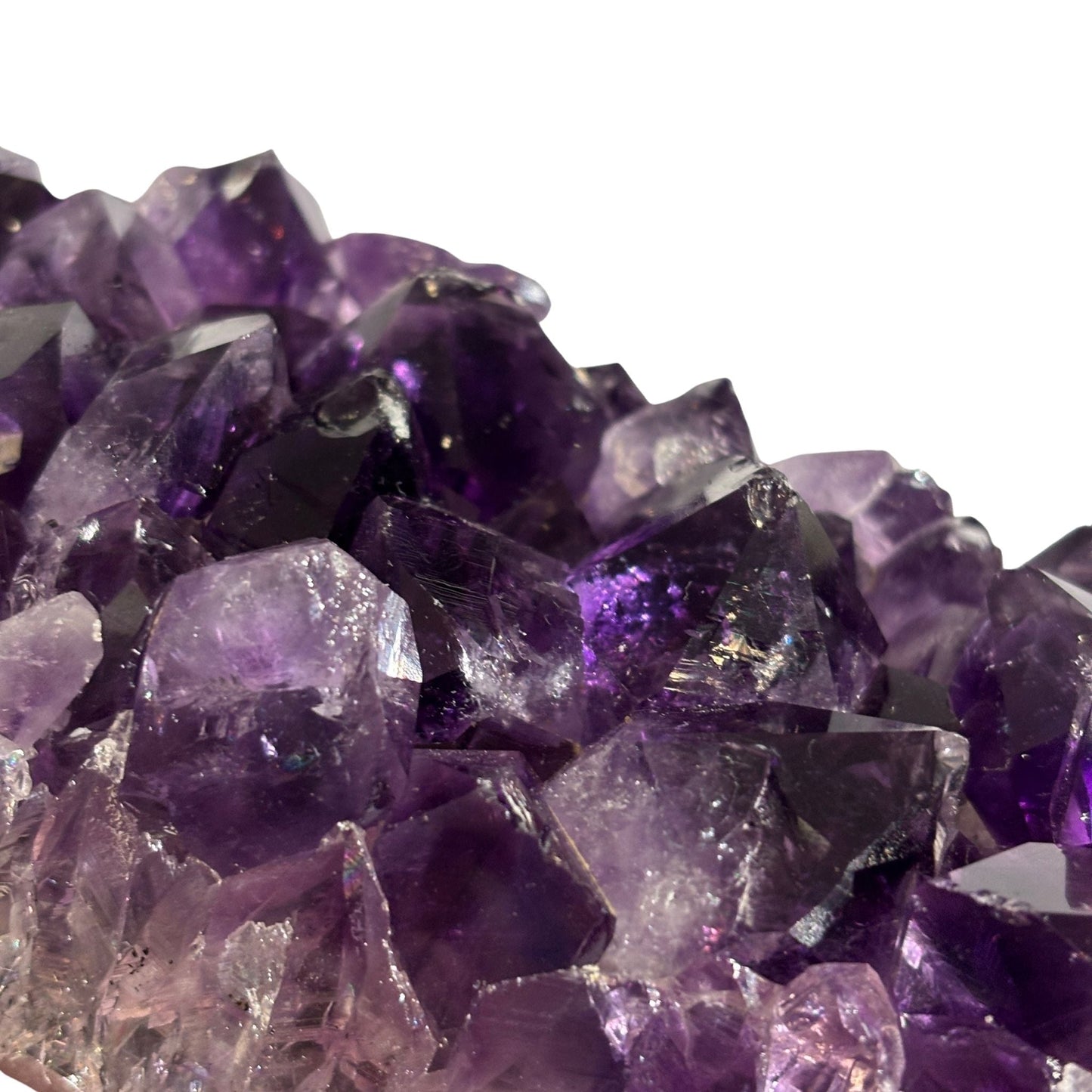 Amethyst geode tower close-up of purple crystals 