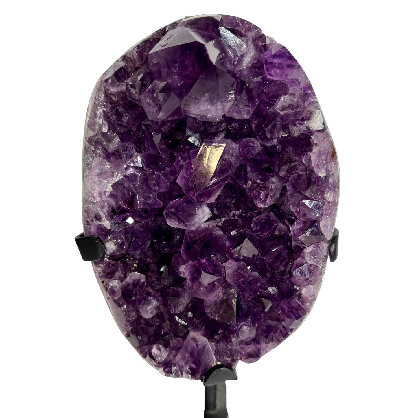 Amethyst geode shaped oval on stand