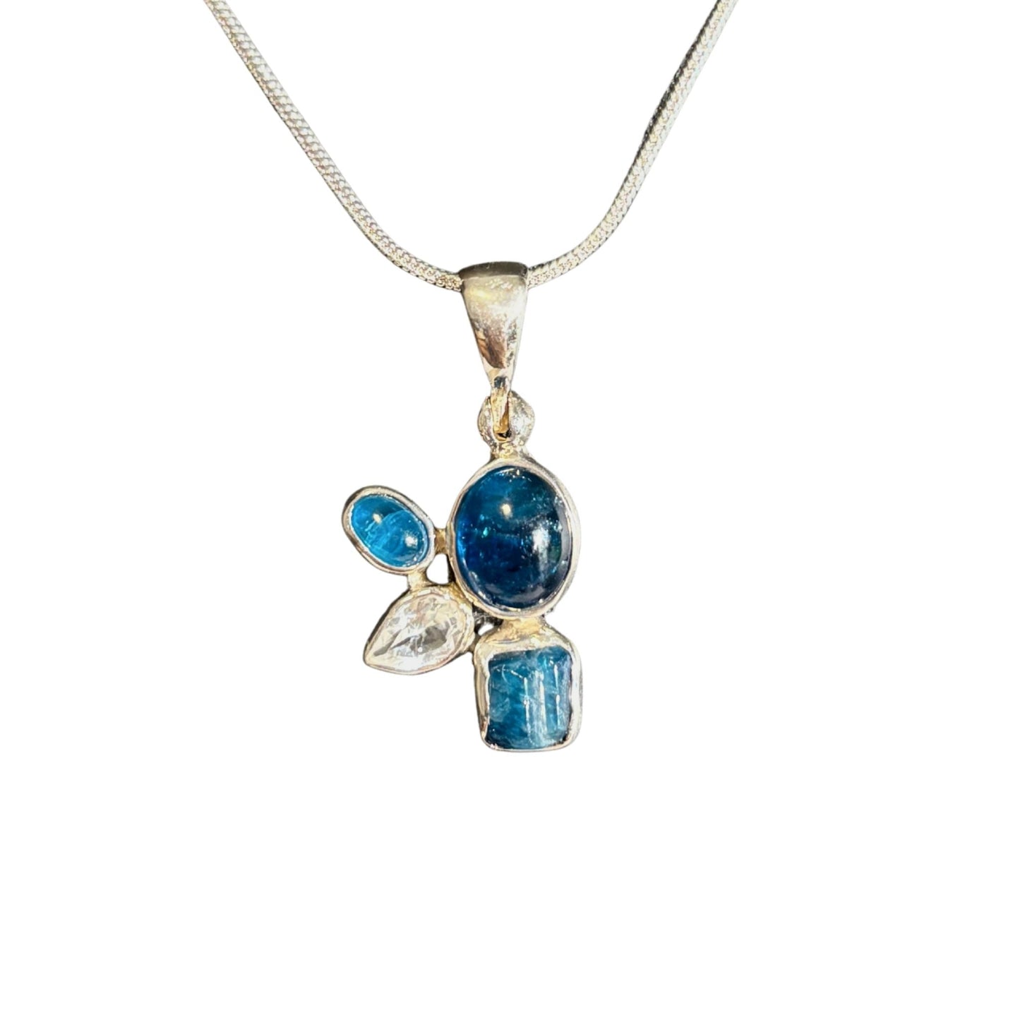 Blue apatite and white topaz pendant on chain white background