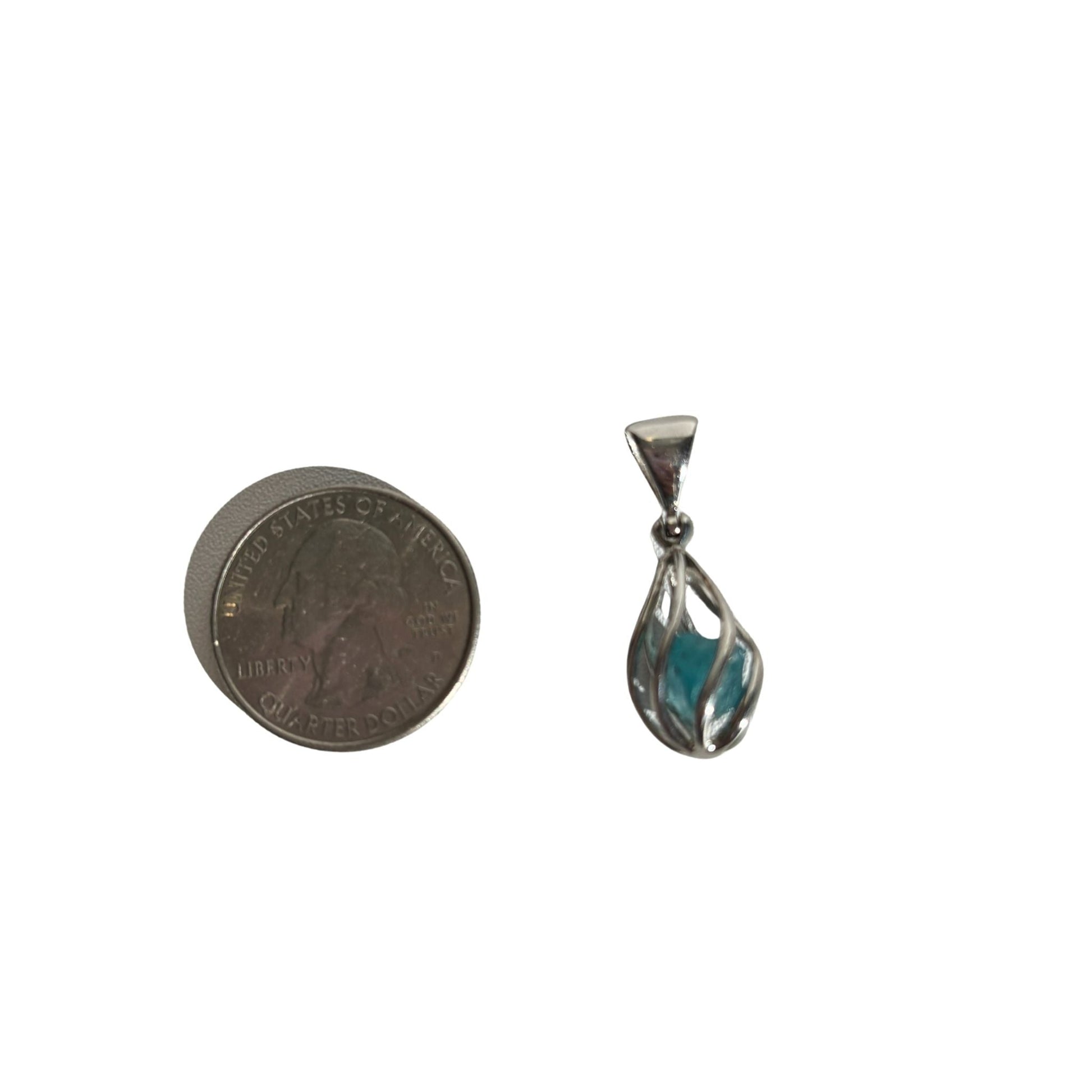 Blue apatite silver swirl pendant size comparison