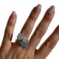 Raw aquamarine dual ring on hand