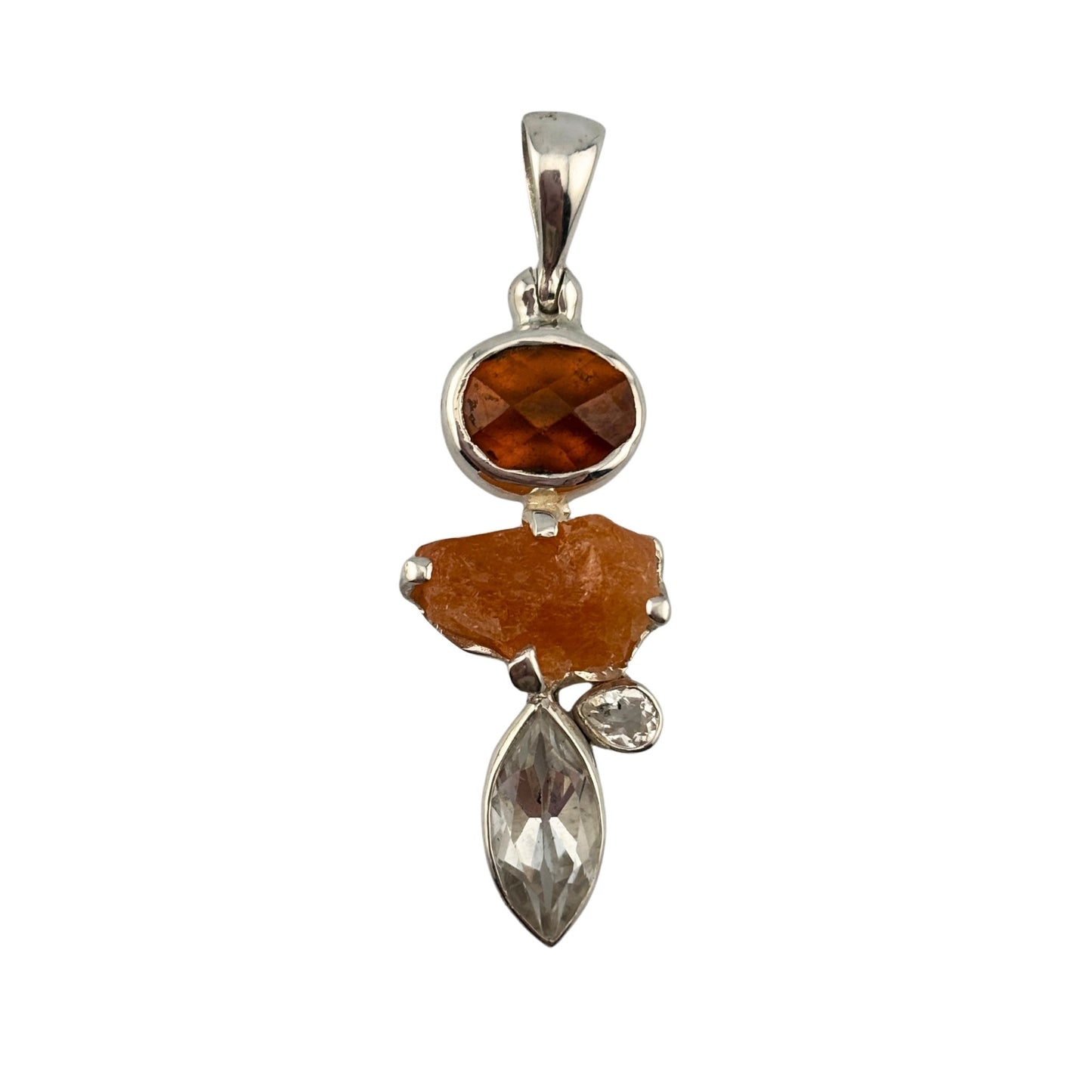 Silver pendant with orange garnets on a white background