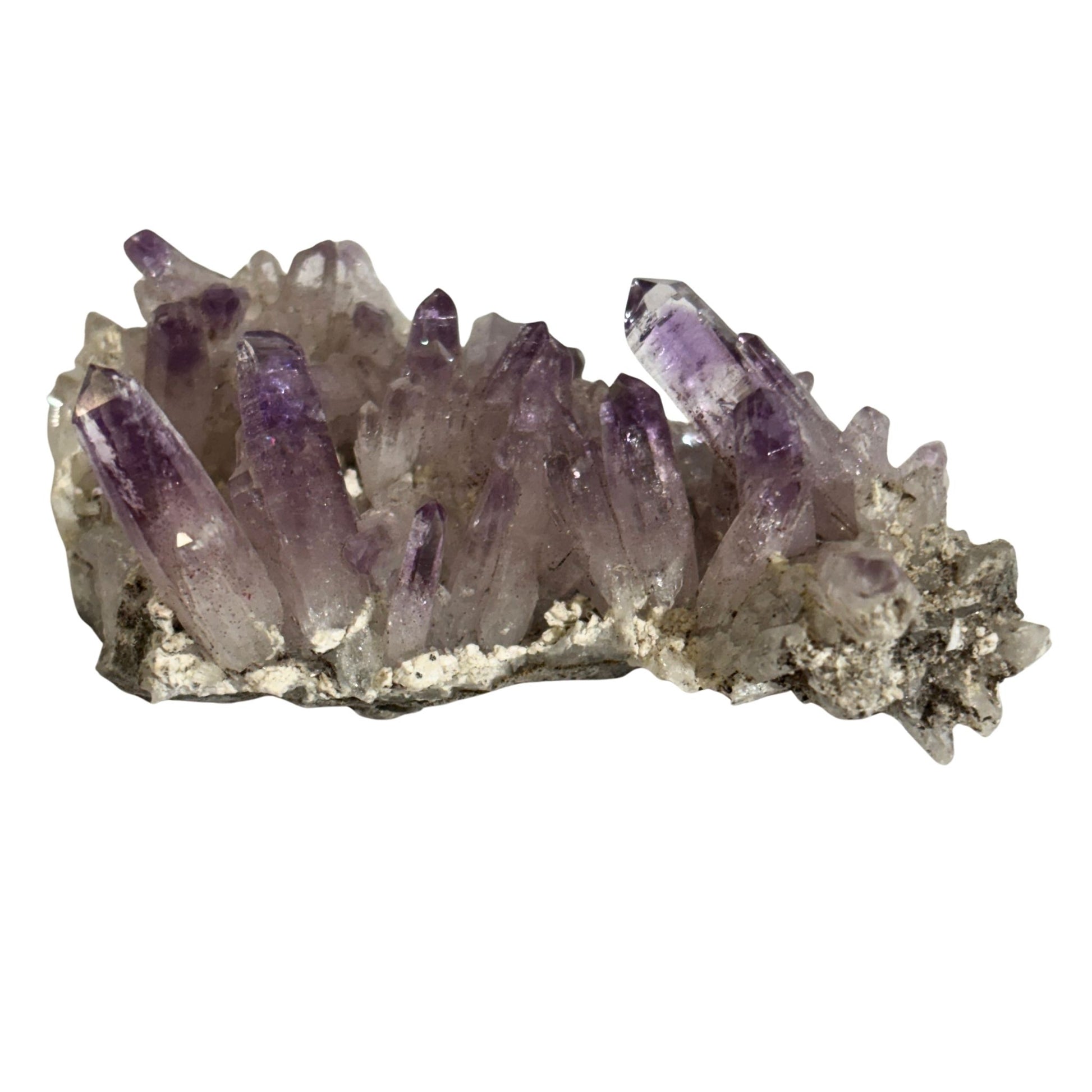 Amethyst crystal cluster on a white background