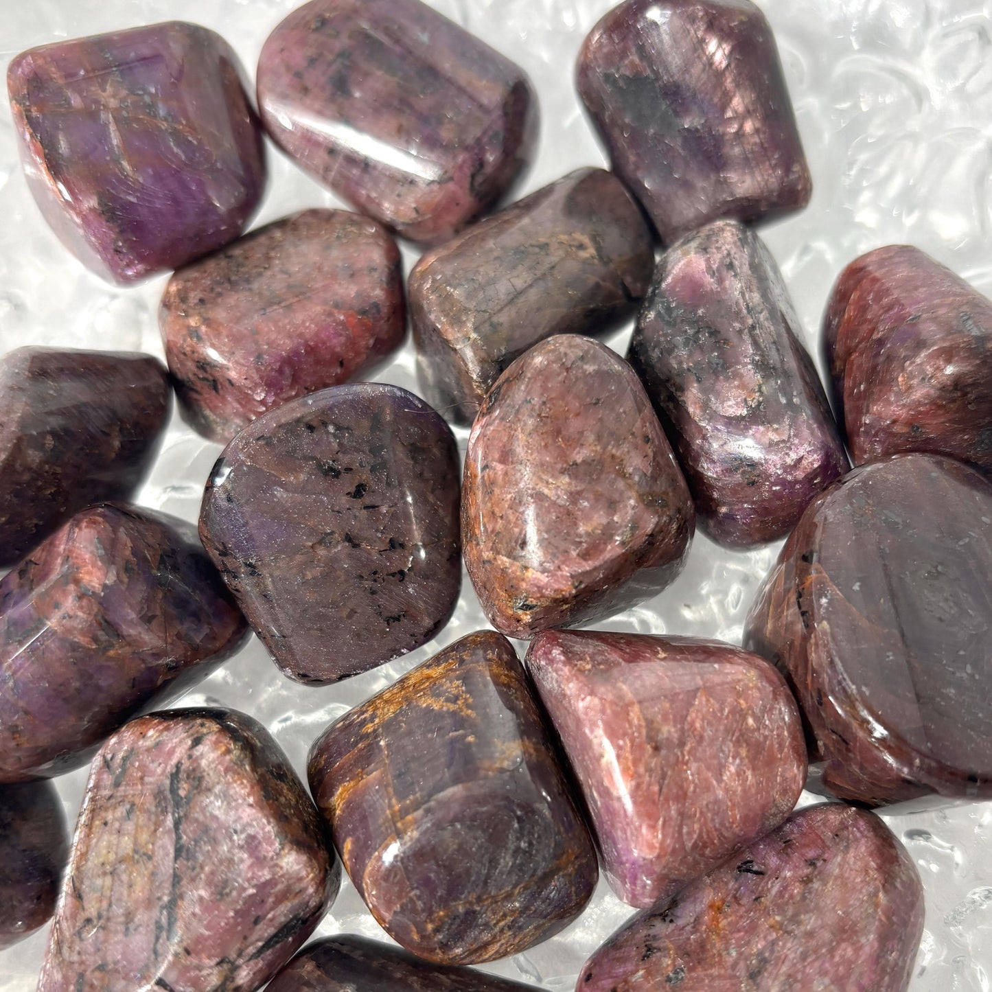 Ruby UV Reactive Tumbled Pocket Stones in Multiple Sizes