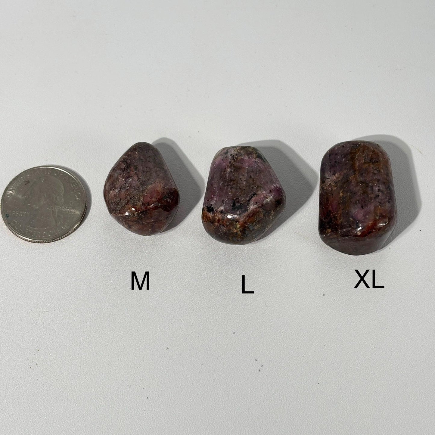 Ruby UV Reactive Tumbled Pocket Stones in Multiple Sizes