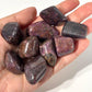 Ruby UV Reactive Tumbled Pocket Stones in Multiple Sizes