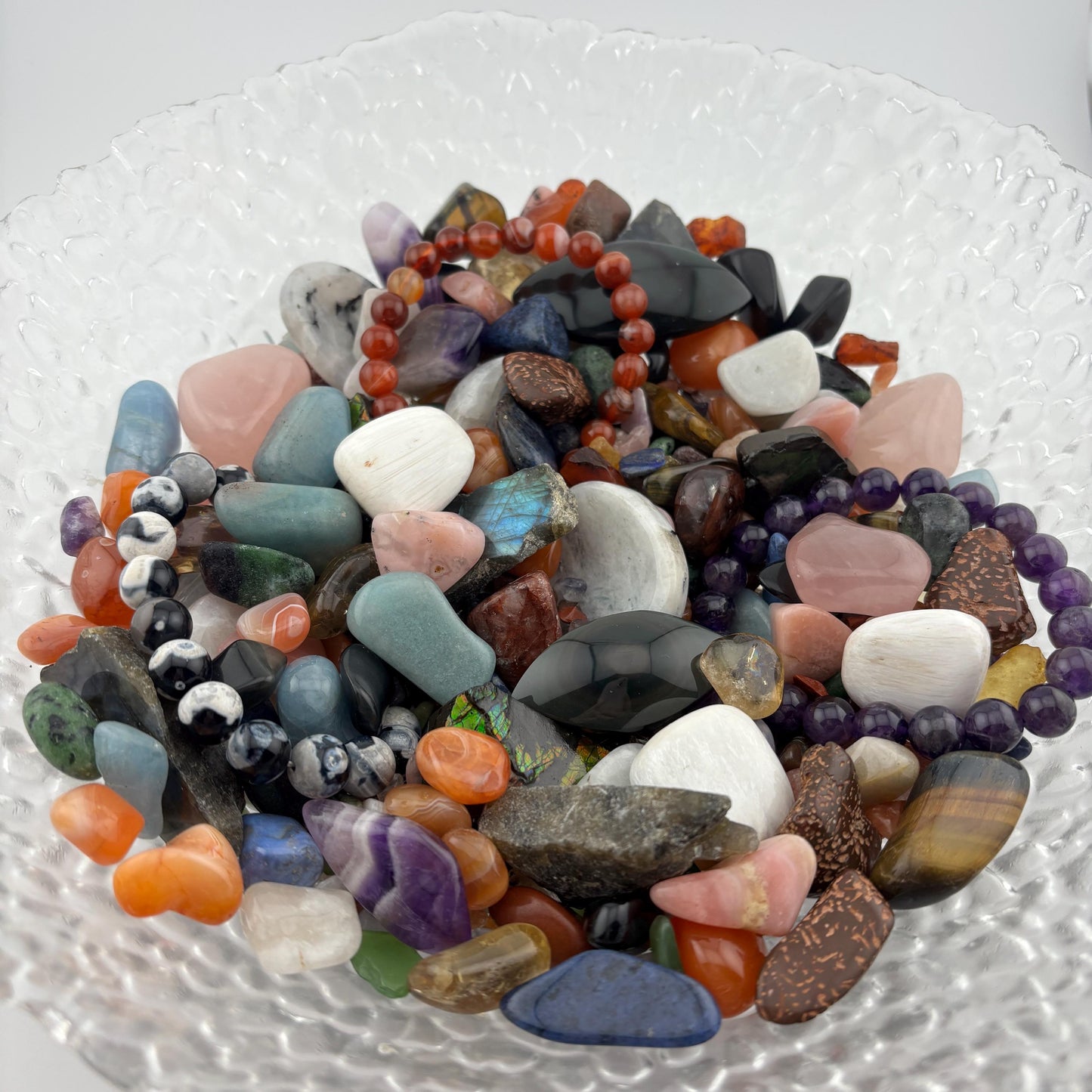 Pride Crystal Confetti, Rainbow Crystal Scoop, Tumbles, Chips, Worry Stones, Crystal Carvings, Crystal Bracelets and More in Multiple Sizes